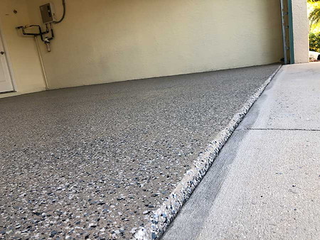 Epoxy vs. Polyaspartic in Florida: Which Floor Coating Holds Up Best?